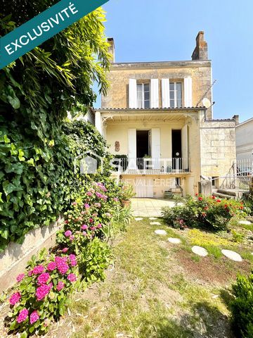 Belle Maison en pierre de 190m2, non mitoyenne, avec jardin, véranda et garages.
