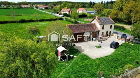 Découvrez cette maison de caractère de 114 m², nichée au cœur d'un vaste terrain de 14 514 m², comprenant un puits. Ce bien est idéal pour les amoureux de la campagne et les projets ambitieux.