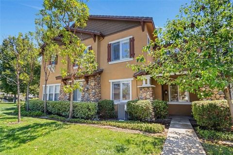 Welcome to this inviting two-story townhome in the sought-after Chambray community of Ladera Ranch. This light-filled home is complete with three bedrooms, two and one-half bathrooms, and an attached two-car direct access garage. The well-designed fl...