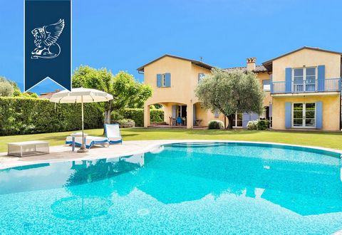 This stunning luxury villa with swimming pool is for sale in the prestigious and renowned town of Forte dei Marmi, on the Tuscan coast. Surrounded by a well-tended park measuring 1,850 sqm that is adorned with olive trees, the property also includes ...