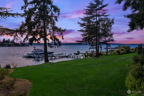Discover the ultimate expression of luxury and prestige on Hunts Point's exclusive shores. This rare, nearly 2-acre west-facing estate boasts 130 feet of Lake Washington waterfront, offering either a canvas for reimagining the existing home or a subl...