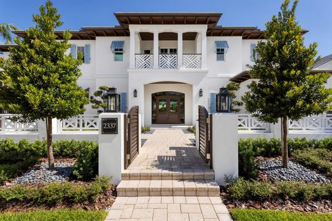 Brand New, West Indies-Inspired Deepwater Estate Sited on 100’+/- of waterfrontage on the wide Flamingo Waterway. Masterfully crafted by renowned builder Summit Builders Of Florida, this residence sets a new standard for living, with craftsmanship an...