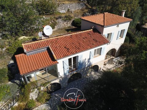 BOUYON 16 klm de Carros: Near village, beautiful detached villa type 4 rooms with independent studio on the ground floor and adjoining land, comprising upstairs an entrance opening onto veranda and kitchen, a living room with fireplace, hallway servi...