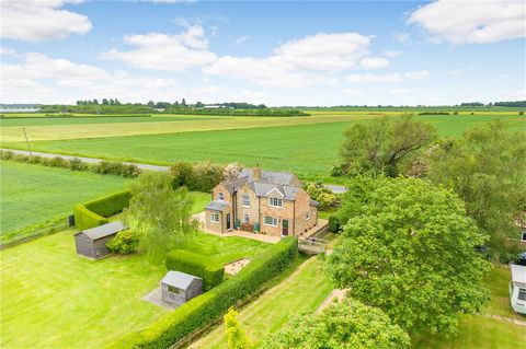 Set on 2.4 acres, this extended period home boasts open field views to the rear and side, as well as extensive outbuildings, one of which has planning permission for conversion into a dwelling. The ground floor comprises a spacious living room with a...