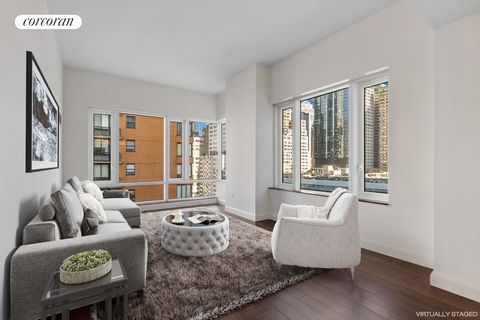 Highest Floor, Corner 1 Bed with 10 1/2 ft ceilings and just below roof terrace for quick access to rooftop and bbq grills.. Very rare, lofty, corner one bedroom with 10 1/2 ft ceilings now available for purchase at the luxury Visionaire Condominium....