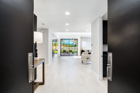 Located in the sought-after Springs Country Club in Rancho Mirage, this sophisticated Broadmoor model offers 2,994 square feet of luxurious living space. Completely renovated in 2023, this home radiates modern sophistication! The spacious open concep...