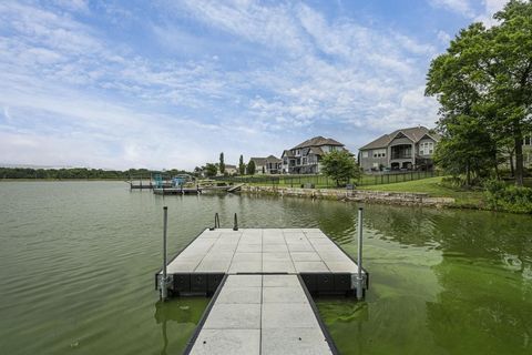 Welcome to 1116 Lakecrest Circle, a luxurious gem located in the esteemed Creekmoor - Edgewater subdivision, offering serene waterfront living. This elegant reverse ranch floor plan features 4 spacious bedrooms and 2.5 bathrooms, perfectly blending c...