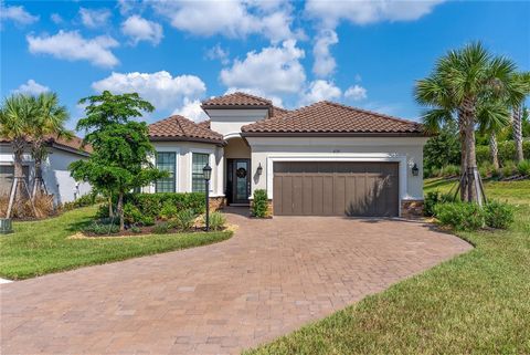 Welcome home to your extraordinary haven in the incomparable Esplanade at Azario in Lakewood Ranch! This breathtaking nearly new (2022) Lazio pool model home boasts numerous upgrades that elevate it to a level of sophistication and comfort unparallel...