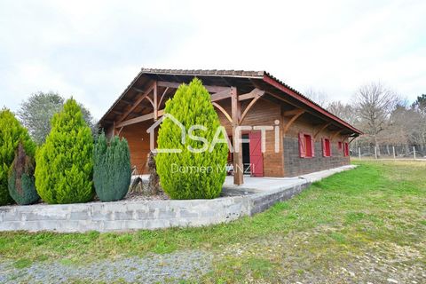 Située à 5 minutes d'Hostens sur la commune de le Tuzan, cette charmante maison en bois bénéficie d'un cadre paisible offrant un mélange harmonieux entre tranquillité et proximité des commodités essentielles. Construite en 2003 sur un terrain de 1162...