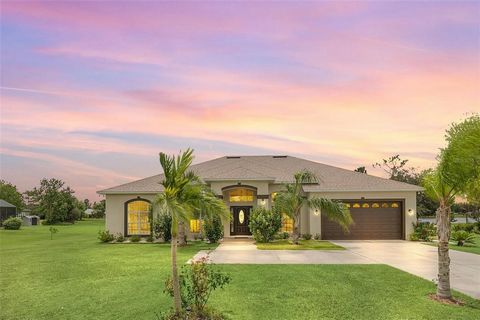 Stunning Lakefront Estate Home!! With a 3-way split floorplan, this 4/3 offers the perfect amount of functionality, privacy, and space! 12' high ceilings, large windows and an 8' sliding door allow natural light and amazing views throughout the home....