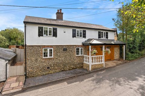 Step Inside Stepping off the road into the porch, you enter the house into a generous hallway with an open wooden staircase and plenty of storage space for coats and shoes.  The double sided wood burner ensures a warm and cosy welcome.  Moving throug...