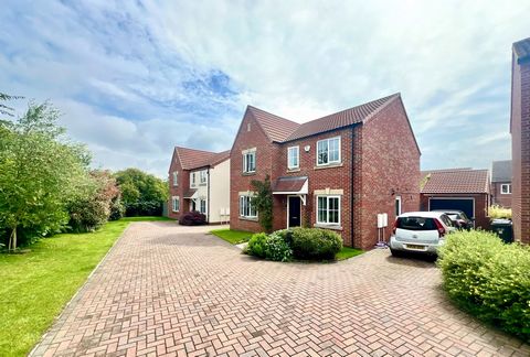 An exceptionally well presented, four double bedroom detached family home, which enjoys a southeast facing landscaped rear garden, a stunning open plan living kitchen and a private tucked away position on the development. The property is offered to t...