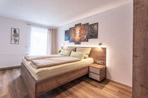 This cozy ground-floor apartment in Drachselsried offers a peaceful retreat for families or small groups. It features two bedrooms, one with an en-suite bathroom, plus a spacious living/dining room with satellite TV, DVD player, and stereo unit. The ...