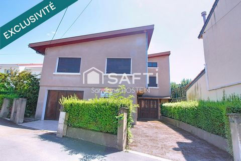 Maison Individuelle de 155m2 avec jardin et 2 garages.