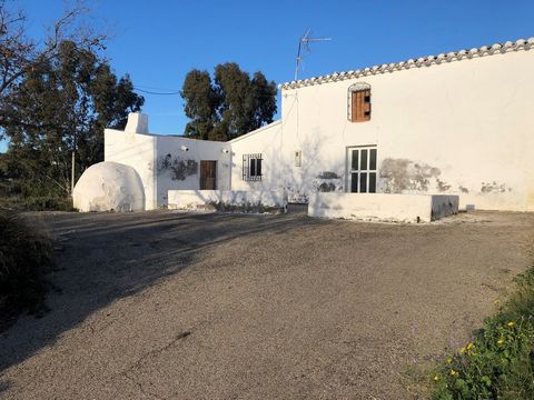 Situated in the picturesque hillside village of Fuente Amarga, this cortijo is a fantastic invesment with the opportunity of being a beautiful family home, however, it will need extensive renovation to bring it up to living conditions.  The approach ...