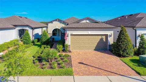 **PRICE BELOW APPRAISED VALUE**SELLER MOTIVATED*MOVE/IN READY**FORMER MODEL HOME**LAKE FRONTAGE**ALL APPLIANCES INCLUDED**Immaculate 2 bedrooms, 2 baths, 2 car garage in one of the most desirable 55+ subdivision, 
