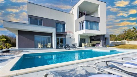 This luxurious modern villa imbued with stylistic balance is located on the east coast of Istria. It is located in the bay of Rakal and attracts attention with its design appearance, while the superior comfort and functionality of the villa confirm i...