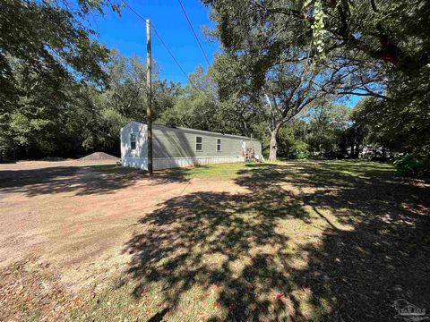 Welcome Home !!! Cute & Cozy 3 Bedroom 2 bath home on half an acre of property 2017 Model with BRAND NEW ROOF !! This is a perfect starter home and is definitely priced to sell !!! Come on out and view today !