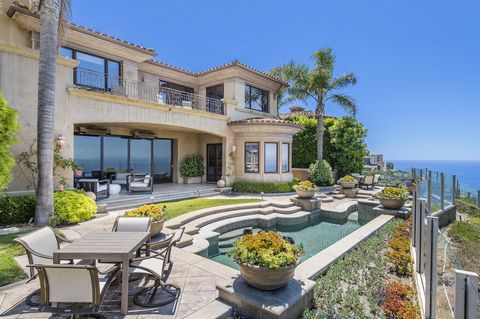 Majestically situated in the prime section of the guard-gated enclave of The Pinnacle of Monarch Point, this commanding residence features panoramic coastal and whitewater views spanning as far as Palos Verdes. This expansive estate is comprised of s...
