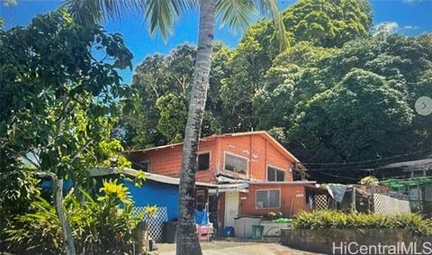 An extraordinary opportunity awaits in the picturesque neighborhood of Kaneohe. This hidden gem offers the perfect canvas for your vision, whether you're seeking an investment, a dream home, or an enticing fixer-upper opportunity. Fixer-Upper Potenti...