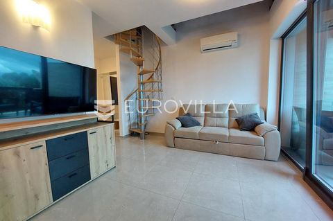 In Pula, more precisely in Pješčana Uvala, the most beautiful part of the city, which, as the name suggests, is adorned with a beautiful sandy beach, this two-story apartment NKP 102.50 m2 is located on the 2nd floor of a quality residential building...