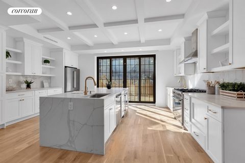 Welcome to 18 Oakland Place, a stunning barrel fronted, 20' wide two-family townhouse nestled in the heart of Flatbush, Brooklyn, originally built in 1901. This impeccably designed residence offers a harmonious blend of modern luxury and timeless ele...