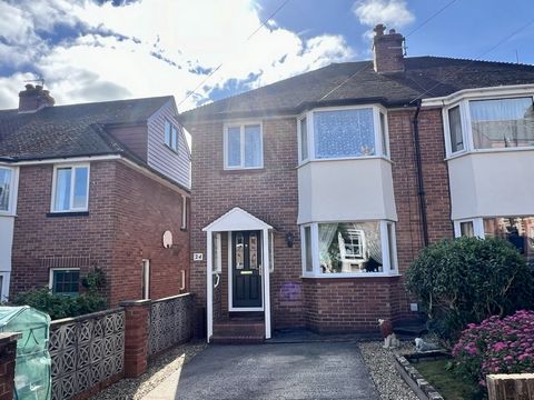 A covered entrance porch leads to a composite obscured glazed front door into the entrance hall, which has understairs storage, an obscure glazed window to the side aspect, radiator, stairs rising to the first floor landing and door to the sitting ro...