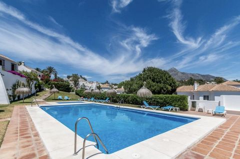 Located in Nueva Andalucía. Simply stunning picturesque townhouse situated within a beautiful Andalusian-style pueblo in the heart of Marbella's Golf Valley in Nueva Andalucia. This completely unique private and gated community of only 77 proper...