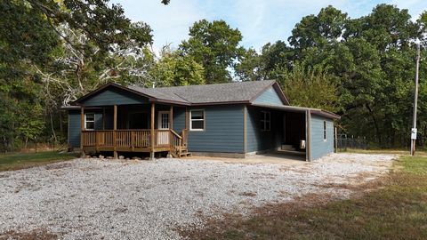 Welcome to your slice of quiet living! This newly remodeled home is on 3 acres with mature trees and the peaceful sounds of nature. Enjoy an open-concept layout filled with warm, natural light. Perfect for relaxing on the new covered front porch.   T...