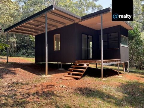 Discover your own piece of paradise at this enchanting rainforest retreat, featuring a brand-new studio cabin and a charming two-bedroom renovator just waiting for your personal touch. Nestled amidst stunning natural beauty, this property boasts a pi...