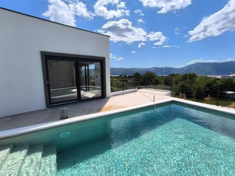 Modern semi-detached villetta (140 m² net) with a 29 m² swimming pool and a beautiful view of the sea and the island of Cres in Linardici, on Krk island. Krk is connected to the mainland by the bridge. The villa consists of a ground floor, first floo...