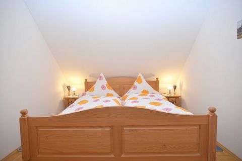 This child-friendly holiday home in Schönsee, Bavaria, is perfect for a peaceful getaway amidst forests and mountains. Just 100 m from the forest and 6 km from cross-country skiing trails, it offers ideal surroundings for nature lovers and winter spo...