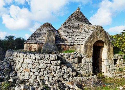 A complex of trulli for sale to be renovated in the countryside of Ostuni. There are two buildings: the first is a three-cone trullo, measuring approximately 30 square metres and is in good static condition; it is possible to extend the building by a...