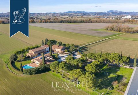 This stunning luxury agritourism resort is for sale in Umbria's leafy countryside, offering the perfect home for lovers of nature and unspoiled landscapes. This wonderful estate includes 12 hectares of gardens, measures 1,900 sqm and consists of...