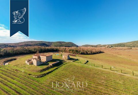 Surrounded by the stunning Tuscan countryside, a few steps away from Siena, is this charming Tuscan hamlet with a pool for sale. Located in a private position with a magnificent panoramic view, this complex is offers various units of exceptional eleg...