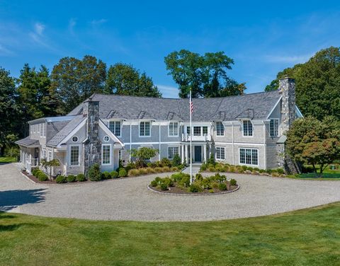 Located in the sought-after waterfront enclave of Wilson Point, this meticulously renovated 5 bedroom 4.2 bath, Nantucket-style shingled residence spans over 6500 square feet of finished space and over an acre of beautifully landscaped grounds. Stepp...