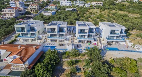 www.biliskov.com  ID: 13621 Makarska, Veliko Brdo Three luxurious detached newly built villas with a total area of 1050.00 m2 on a plot of land with an area of 1260.00 m2. The villas are 350.00 m2 each on a plot of 420.00 m2. The villas consist of a ...