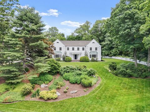 Welcome to your dream home beautifully sited on almost 2 acres with a pool, spa and flat back yard for enjoying the surrounding peace and serenity. Located minutes from New Canaan's vibrant downtown, renowned for its exceptional schools and community...