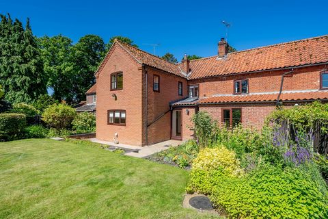 In the centre of this popular North Norfolk village of Hindolveston and hidden up a small lane is this immaculate two bedroom mid-terrace cottage with a large and beautifully planted south facing garden. The cottage has a wonderful feeling of space a...