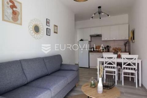 A beautiful apartment on the city's outskirts is located on the ground floor and 40.61 m2 offers a perfect arrangement of rooms. It consists of an open living room with a kitchen and dining room, two bedrooms, a bathroom, and a garden. Part of the ga...