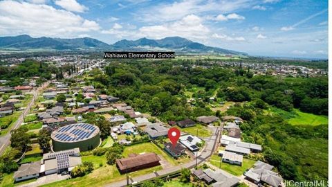 Welcome to this charming 4-bedroom, 1-bathroom home located in the heart of Wahiawa. This home offers the perfect essence of island living, coupled with its prime central island location, this home is perfect for those looking to make Oahu their home...