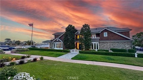 Welcome to one of the absolute best bayfront locations in Newport Beach. Located in Beacon Bay, this south-facing, Eastern Seaboard inspired trophy home is situated on one of five exclusive 50-foot bayfront corner lots adjacent to the green grass est...