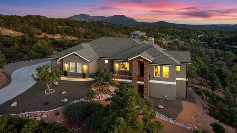 This stunning home, recently constructed by the esteemed Crystal Creek Homes, is arguably better than new. Set on just over 2.5 acres in the impressive Inscription Canyon Ranch, it offers nearly 360-degree panoramic views of the surrounding mountain ...