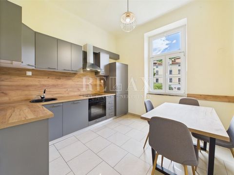 In one of the most desirable locations in Opatija, just 200 meters from the sea and 100 meters from the very center of the city, a bright and spacious two-bedroom apartment with a total area of 59.79 m² is for sale, which also includes a 3.70 m² stor...