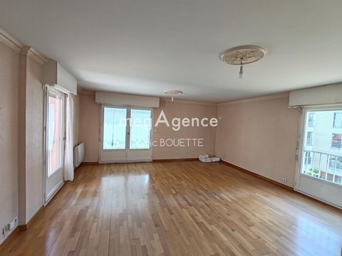 Spacieux appartement avec balcon, cave et garage