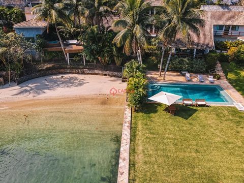 Wspaniała rezydencja z prywatną plażą w Angra dos Reis-RJ Nadbrzeżna rezydencja z 7 sypialniami, 5 apartamentami, będąca mistrzem. Zatwierdzone lądowisko dla helikopterów Dom dozorcy Generator, który podtrzymuje cały dom z dużą ilością resztek Uzależ...