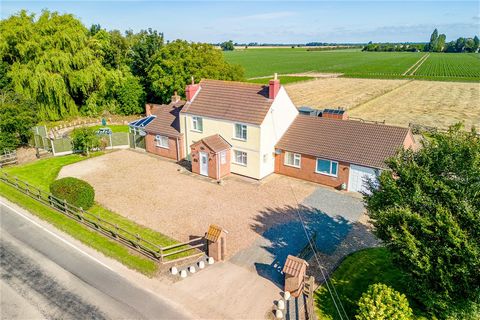 An extraordinarily versatile, low maintenance property is presented in excellent order; originally a farmhouse which has been greatly extended and modernised to include a conservatory, which sits on a 3.7 acre plot (sts) with expansive paddocks of ar...