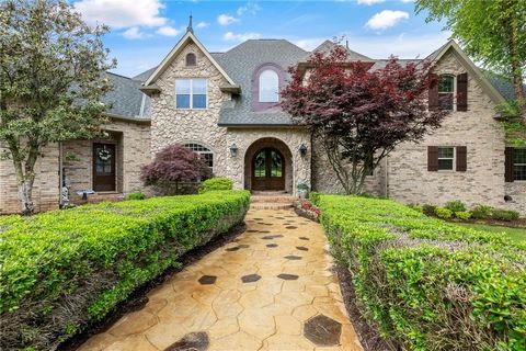 Step into the enchanting world of Maple Manor, where the a harmonious fusion of natural beauty & luxurious living. Nestled amidst sprawling woodlands, this estate offers a serene retreat-like privacy, where deer and other wildlife gracefully roam the...
