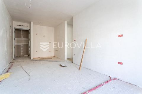 Makarska, one bedroom apartment located on the first floor of a modern building under construction. It consists of a bedroom, bathroom, kitchen with dining room, living room and terrace. The floor area of the apartment is 35.26 m2, while the area of ...