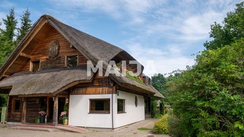 Een landhuis met een houten gebouw en een tweede woonhuis op het grondgebied. Goed onderhouden groengebied 15339 m2, verharde oprit, omheind terrein, ruimte voor meerdere auto's, bewaakt terrein. Zwembad, sauna, douches. 8 kamers op de tweede verdiep...